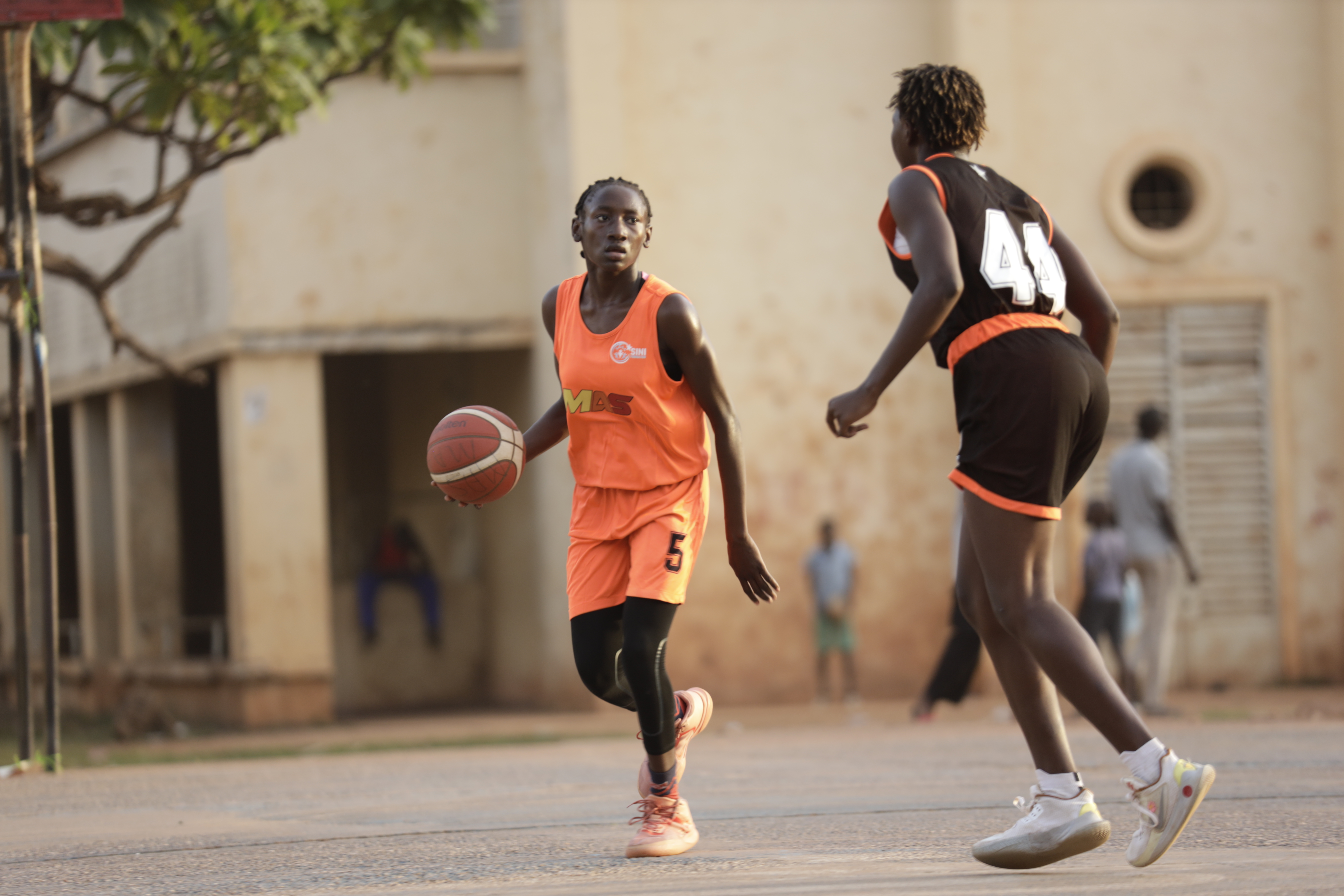 Competitive basketball game at African youth tournament