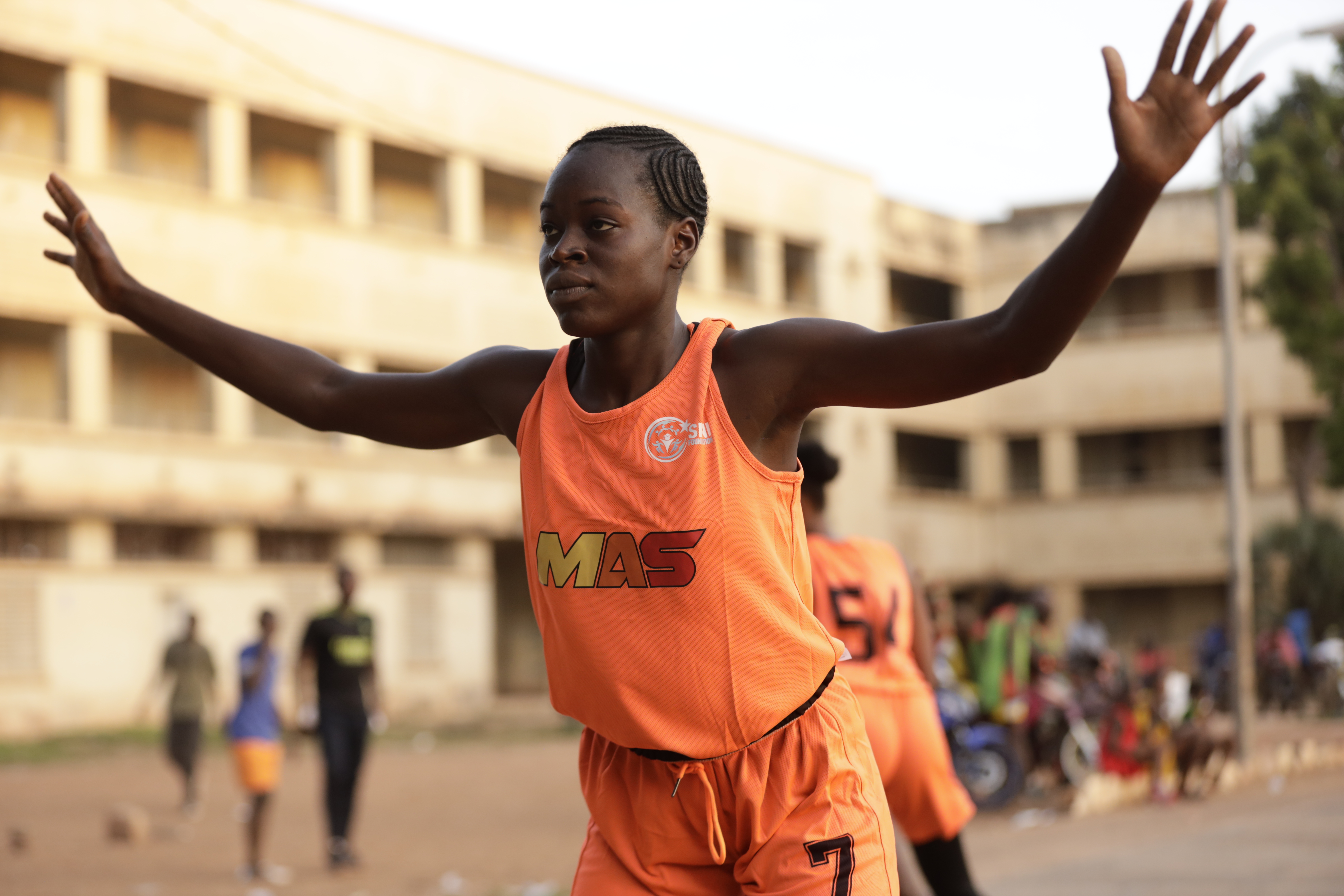 Scouts taking notes during African basketball showcase